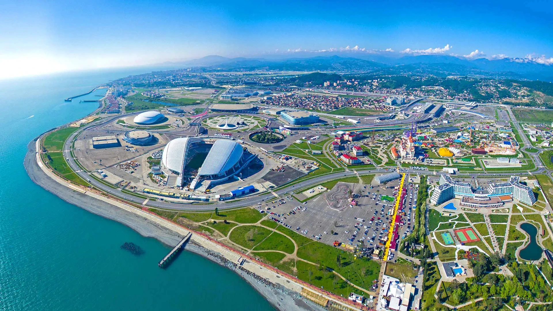 A Panoramic View Of Sochi'S Coastline, Showcasing The City'S Stunning Beaches And The Black Sea.