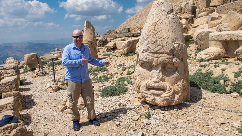 Colossal statues at the summit of Mount Nemrut during sunrise